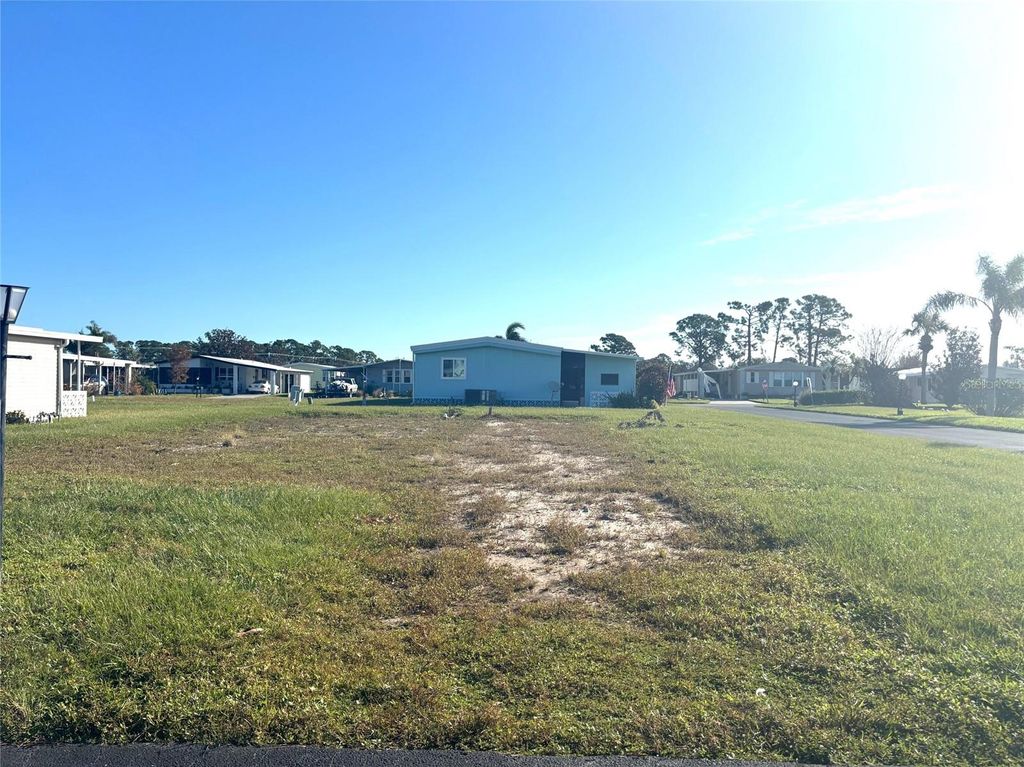 Photo of 413 El Prado Ave, North Port, FL 34287 (MLS # TB8312349)