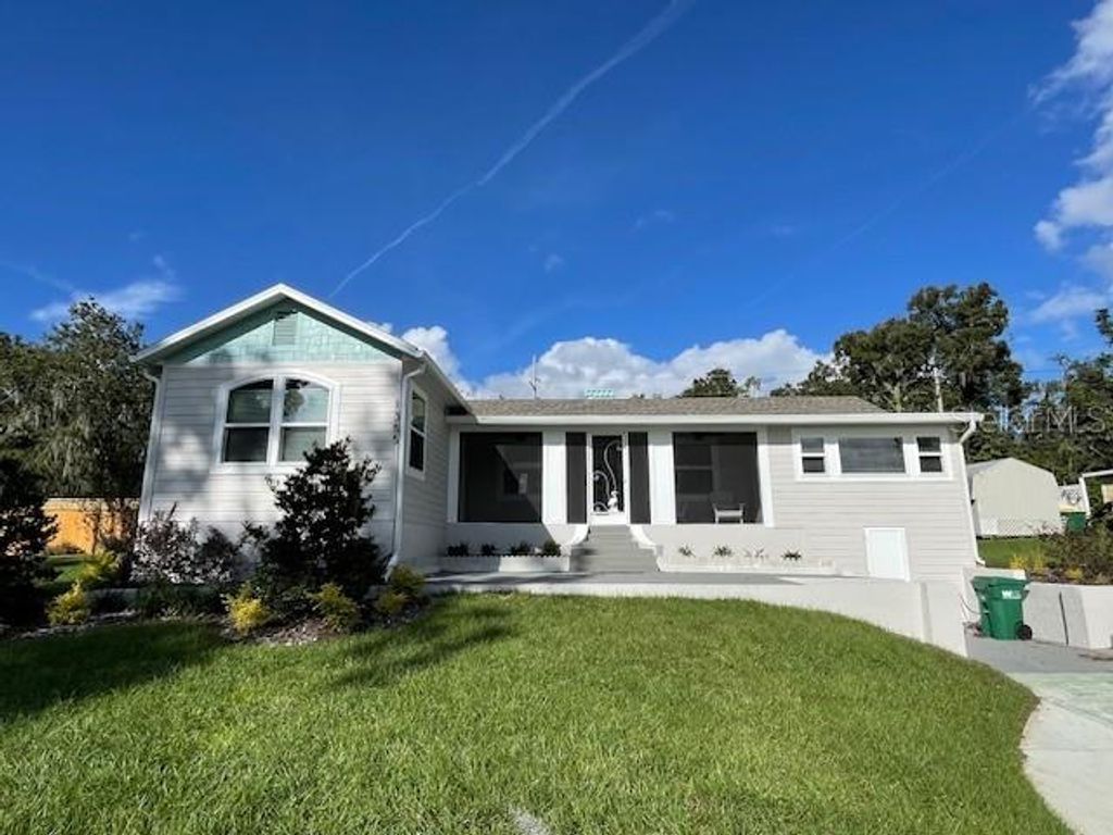 Photo of 1355 Lakeshore Drive, Mount Dora, FL 32757 (MLS # O6385332)