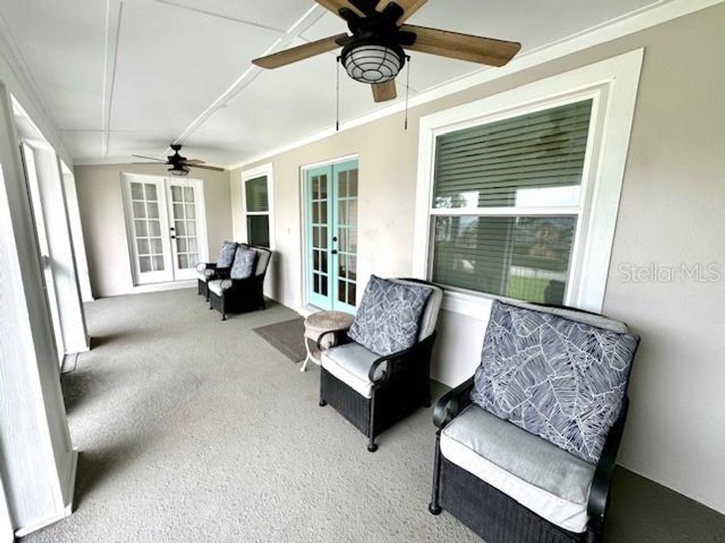 Photo of 1355 Lakeshore Drive, Mount Dora, FL 32757 (MLS # O6385332)