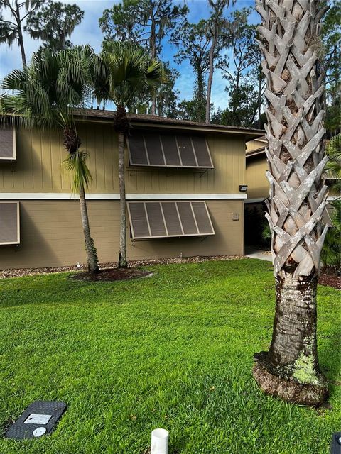Photo of 120 Hibiscus Woods Court #11B, Deltona, FL 32725 (MLS # O6319844)