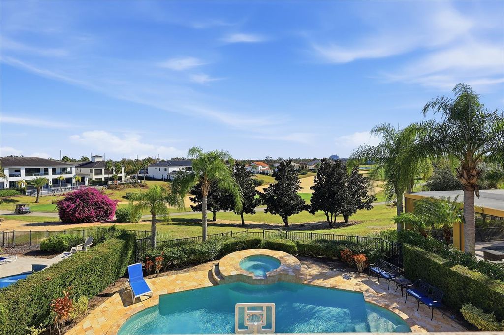 Photo of 441 Muirfield Loop, Reunion, FL 34747 (MLS # O6387531)