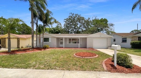 2530 FLINTWOOD DR, HOLIDAY, FL 34690 - Image 397fce1cd6a5e5b01c78cbf498e6bef7/2623435680