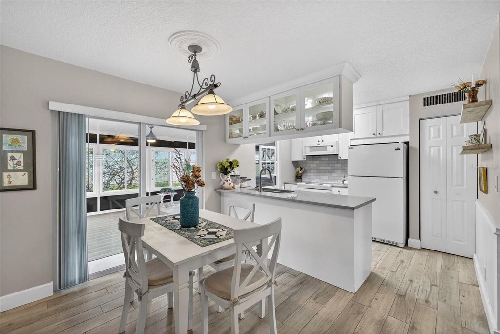 Photo of 1605 Amberlea Drive N, Dunedin, FL 34698 (MLS # TB8482345)