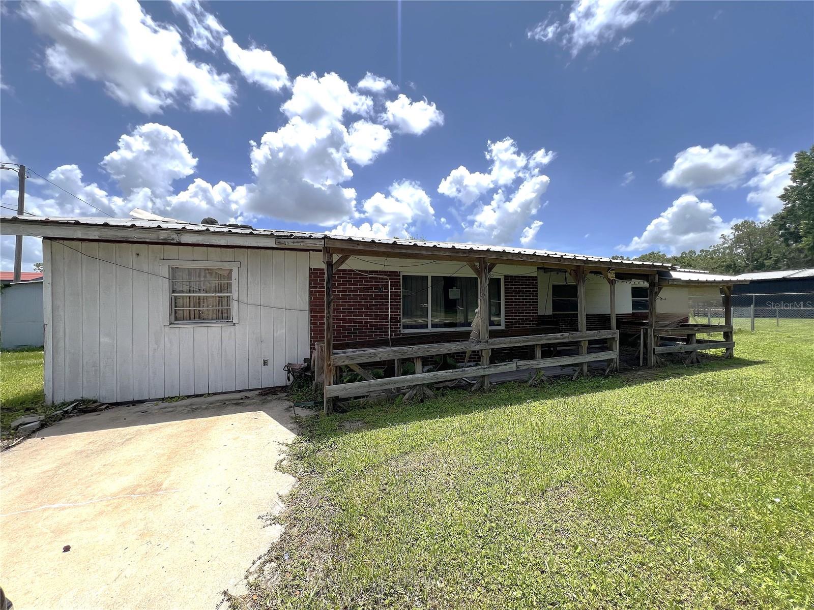 Calling all investors or crafty buyers! Here’s your chance to make this solid 3-bedroom, 2-bath block ranch in Plant City your own. This single-family home features an inside utility room for added convenience, a fenced yard perfect for pets or play, and a detached utility shed for extra storage. Enjoy relaxing on your covered front porch while taking in the Florida sunshine. Just under 3 miles from the Plant City Business District and the iconic Strawberry Festival Grounds, you’ll love being close to local events and sweet traditions. This home has such potential to shine. Don’t miss this great opportunity—schedule your showing before it’s gone!