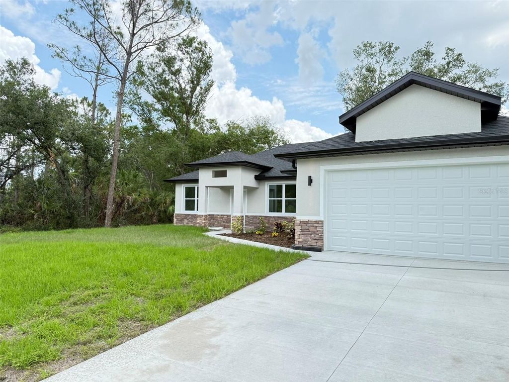Photo of 1074 Kacerik Street, North Port, FL 34288 (MLS # O6375479)
