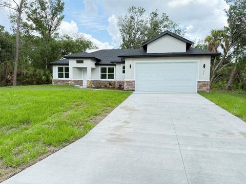 Photo of 1074 Kacerik Street, North Port, FL 34288 (MLS # O6375479)