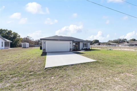 Photo of 13188 SW 103rd Street, Dunnellon, FL 34432 (MLS # OM716313)