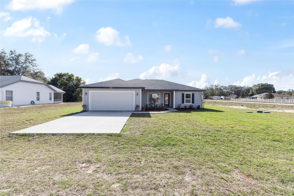 Photo of 13188 SW 103rd Street, Dunnellon, FL 34432 (MLS # OM716313)