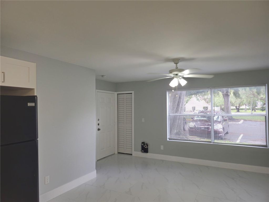 Photo of 4744 Walden Circle #13, Orlando, FL 32811 (MLS # O6366352)
