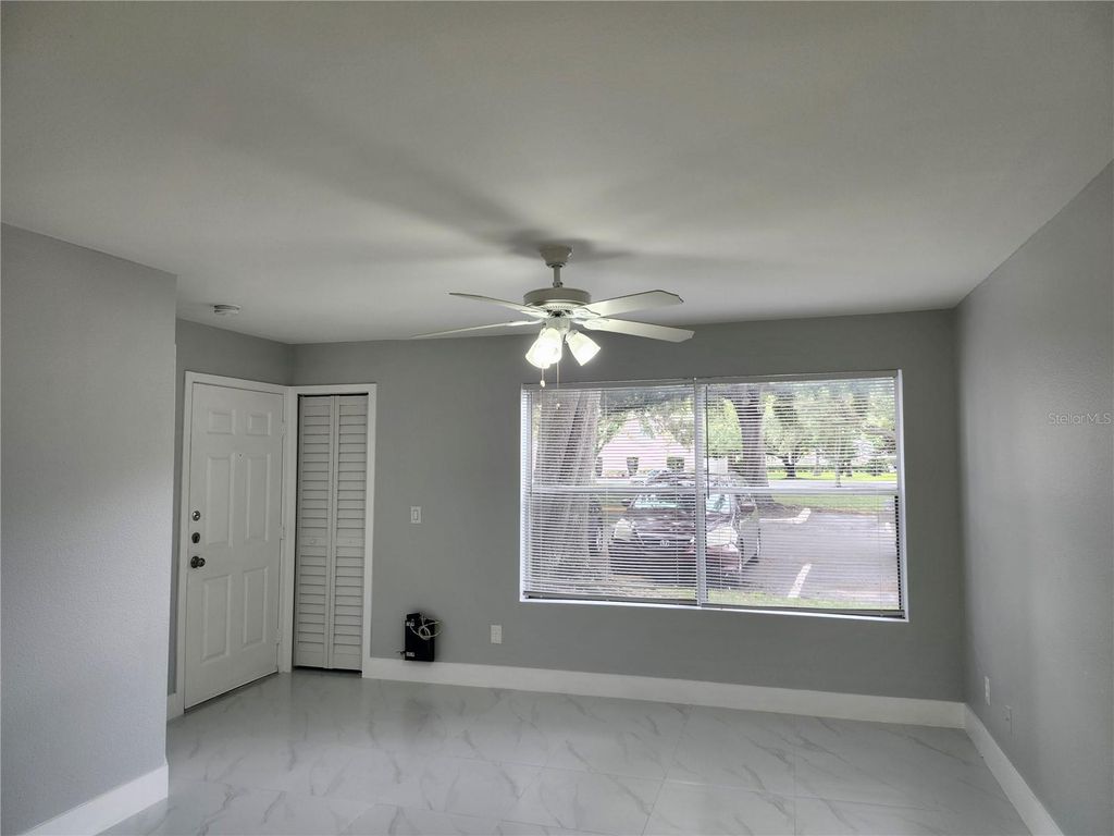 Photo of 4744 Walden Circle #13, Orlando, FL 32811 (MLS # O6366352)