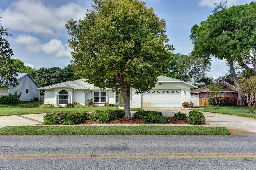 PRICE REDUCED !!!! ...Beautifully maintained split plan home on highly desirable S Riverside Drive. Home sits on an oversized fenced in lot with lush landscaping, irrigation system with its own well. Great floor plan with large open concept living spaces. Huge kitchen with ample cabinets for storage, quartz countertops, track lighting, and updated appliances. Master bedroom includes a gorgeous bedroom suite 
master bath has dual vanities, and large walk in master closet. 2nd and 3rd bedroom split plan for added privacy offers custom designed lighted closets. Spacious enclosed Florida room with access and views of the beautiful backyard and plenty of room for that pool. 2 car garage with built in storage cabinets and utility sink.  Home offers Hurricane shutters, motion activated outside lighting, and upgraded windows. AC updated in 2014, all new plumbing and water heater 2020. Home is located close to all major shopping, and easy access to I 95. Call now for your private showing before this turn key gorgeous home is SOLD.. ;Water: City