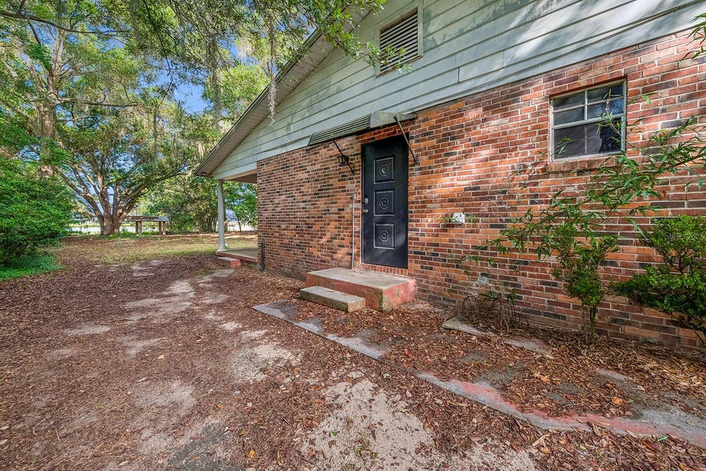 Photo of 7908 Lake Geneva Lane, Keystone Heights, FL 32656 (MLS # GC542078)