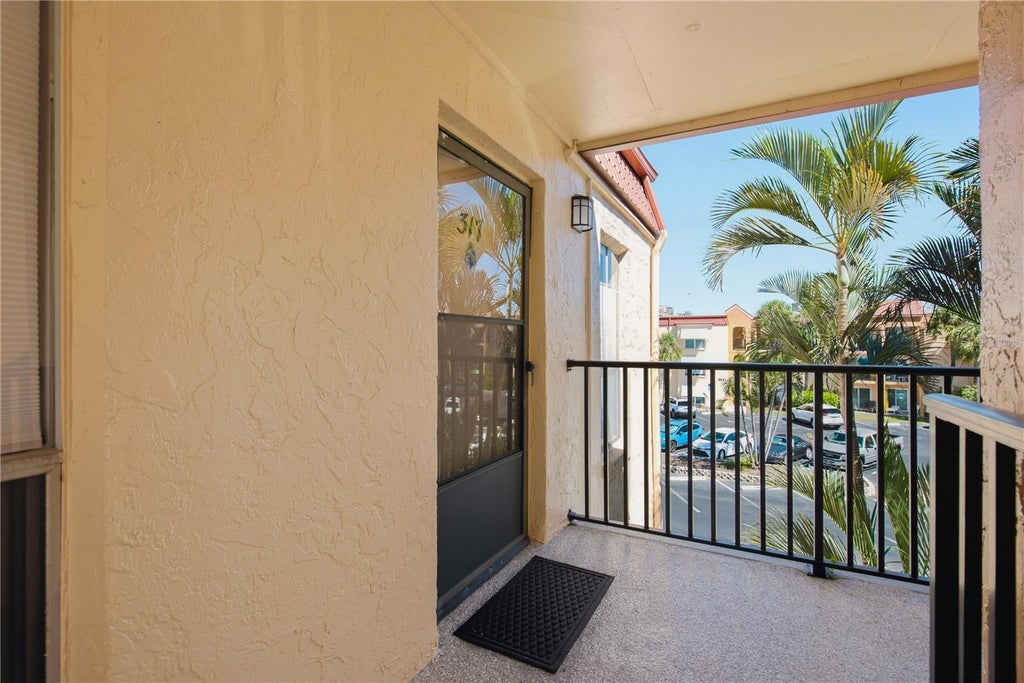 Photo of 8911 Blind Pass Road #317, St Pete Beach, FL 33706 (MLS # TB8557900)