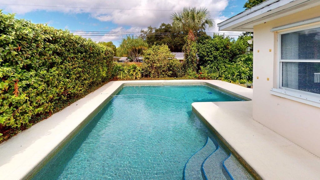 Photo of 1618 Tuscola Road, Clearwater, FL 33756 (MLS # TB8561939)