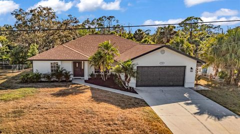 Photo of 730 Lomond Drive, Port Charlotte, FL 33953 (MLS # C7518561)