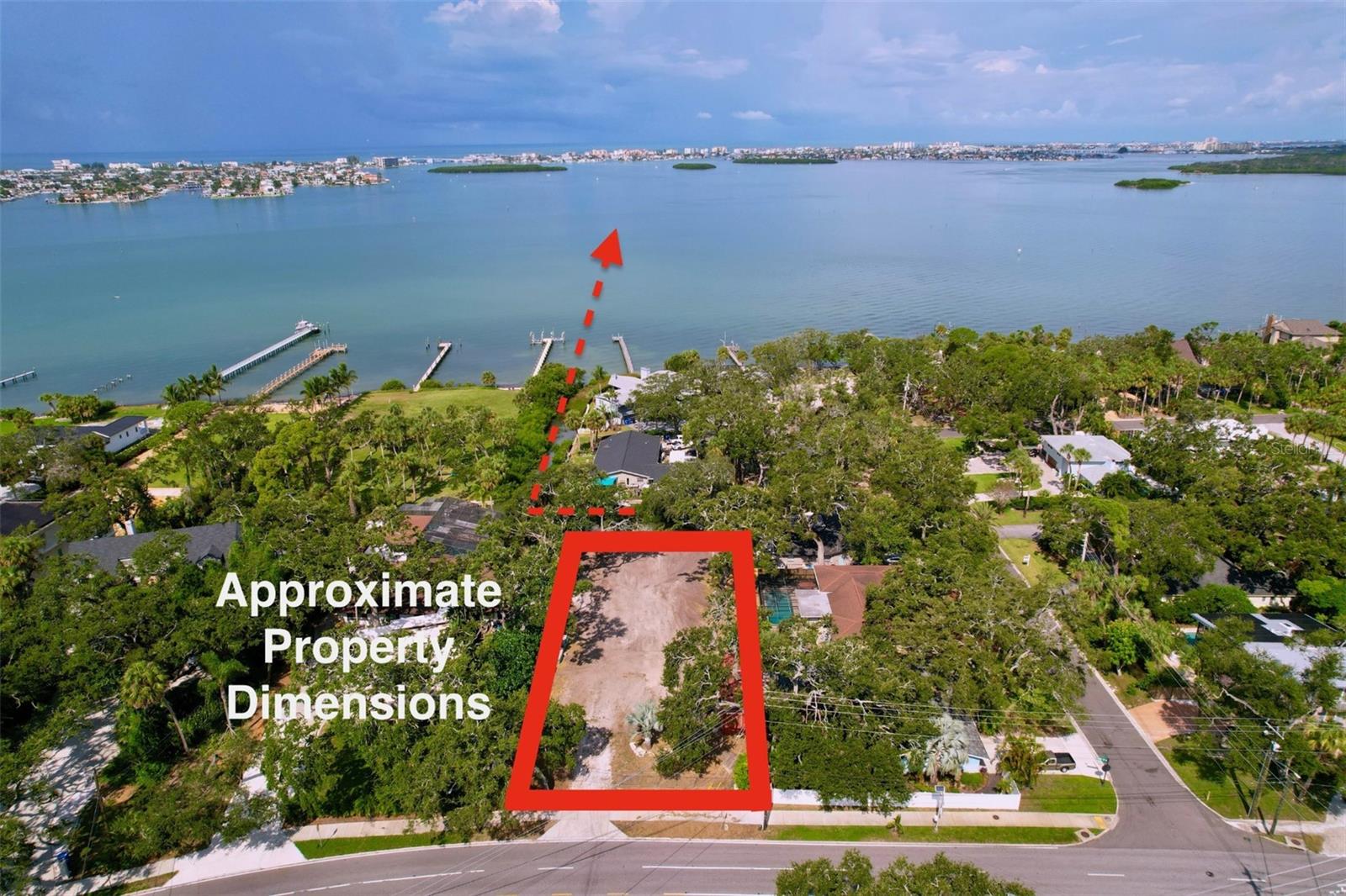 Build Your Dream Home on Prestigious Park Street
An exceptional opportunity awaits to own one of the last buildable lots on Park Street in St. Petersburg’s coveted Jungle Prada / Jungle Cove neighborhood. This oversized parcel has already been improved and is ready for new construction: the lot has been graded, temporary power is connected, and city water and sewer are installed and fully functioning. In addition, a private well provides running water, ideal for irrigation.
The property sits on higher ground, offering peace of mind and safety from flooding, and comes with a granted variance making it fully buildable. A complete set of architectural plans for a three-story luxury residence has already been submitted for permitting—giving a new owner the option to move forward quickly with construction, or start fresh with their own vision.
From the elevated living levels, you’ll enjoy breathtaking water views across Boca Ciega Bay, similar to those from neighboring estates, as confirmed by aerial photography. The property also backs onto the Reese Canal—perfect for kayaks and paddle boards—and is just one block from the public boat launch and the historic Tocobaga Indian village at Jungle Prada.
Surrounded by multi-million-dollar homes and shaded by mature oaks, this is a rare chance to create a signature estate in one of St. Petersburg’s most enchanting settings. You’ll be minutes by car or boat to Treasure Island, Madeira Beach, and downtown St. Pete, with shopping, dining, and parks all close by. This truly is your last chance at an extraordinary estate lot in Jungle Prada, where peacocks still roam and history meets luxury.