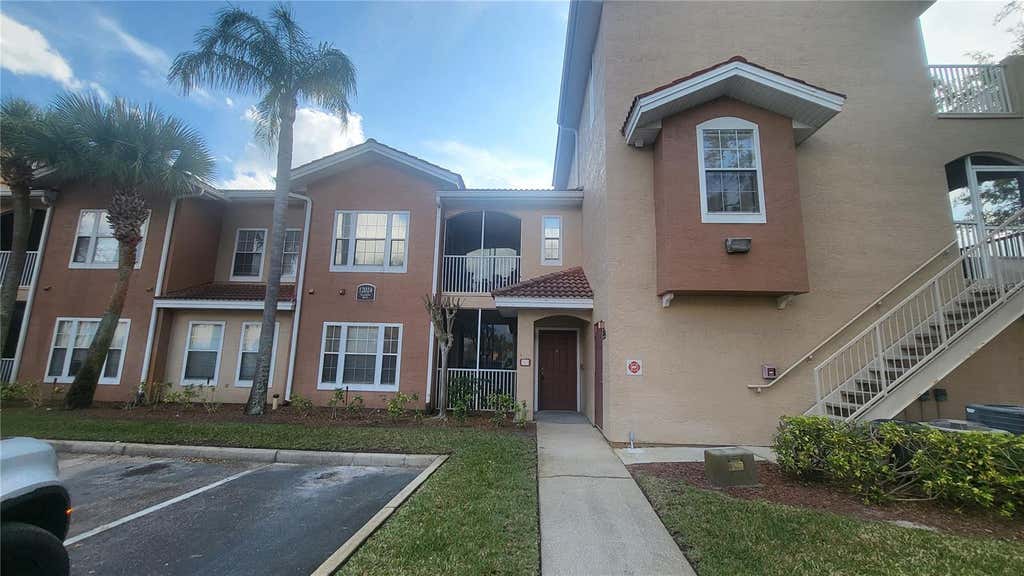 Photo of 12024 Villanova Drive #103, Orlando, FL 32837 (MLS # O6429474)