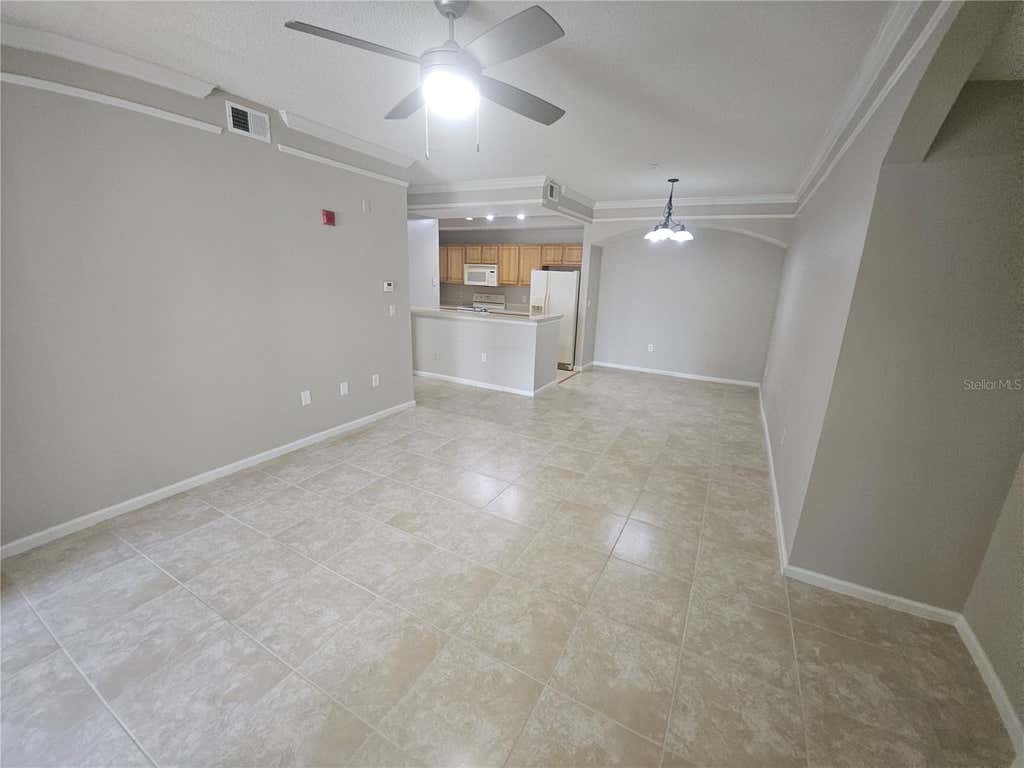Photo of 12024 Villanova Drive #103, Orlando, FL 32837 (MLS # O6429474)