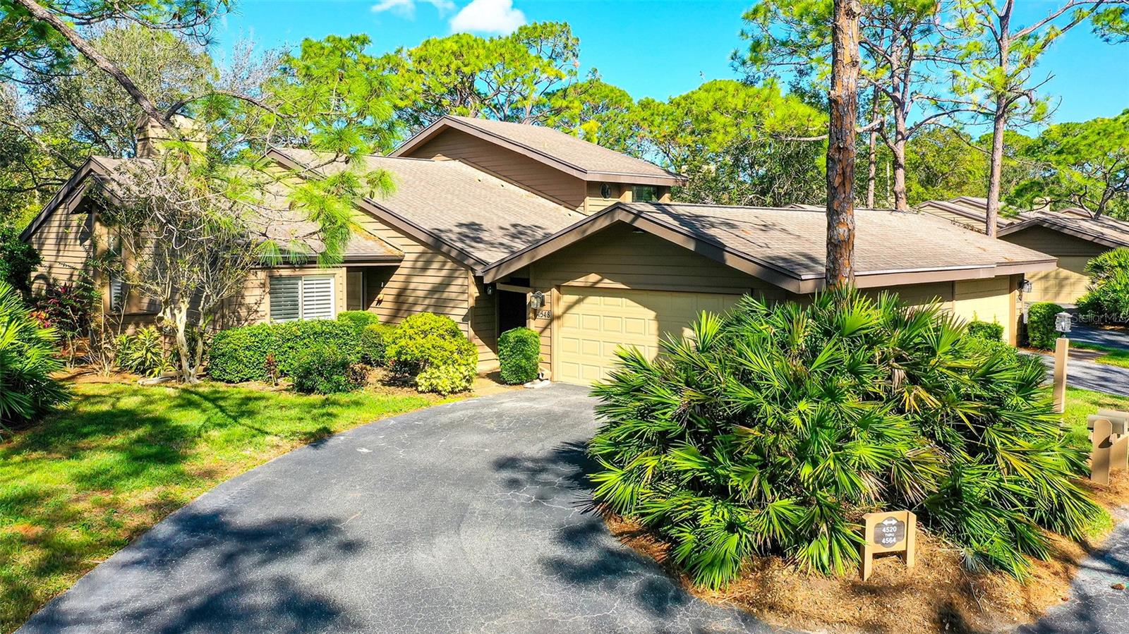 RENT ANNUALLY as of Feb 1, 2025 - This gorgeous maintenance free villa (furnished) is nestled in the best location in the Meadows community, viewing only greenery of the golf course and away from all the traffic noise. The moment you enter, the openness of the floor plan and the 18' high ceiling will make you feel home. The entire property has travertine and porcelain flooring. The kitchen has been entirely remodeled with white cabinets, Kitchen Aid stove and refrigerator, and Wolf range hood, LG dishwasher (1 year old), beautiful dark marbled counter top granite and designer travertine full backsplash, designer lights throughout the kitchen. The double-faced black galaxy granite fireplace enhances both the dining and living room. The living room features a built in wet bar with a wine refrigerator to satisfy all your entertaining needs. The lanai is enclosed and has vents for the A/C adding another 190 SQF to your living area where you can relax, read a book or have a drink. Brand new high efficiency HVAC in 2024 will give you many years of worry free. The primary bathroom was also remodeled few years back and has 2 separate vanities and beautiful custom shower. All rooms are very large and the home offers a lot of closets for your storage needs. The property also offers a very private patio for you to enjoy an outdoor sitting and to locate your grill. The Chandlers Forde community has 2 pools. The Meadows is a very desired community that offers 14 miles of walking trails, over 80 lakes, 2 public golf courses and one private one, tennis courts, Jr Olympic size swimming pool, pickle ball courts, fitness center and more. Location, location , location! This lovely home is just 5 min away from UTC, the mall, numerous restaurants, the new Mote Aquarium, PopStroke, medical center, 20 min away from the beach, 20 min away from SRQ airport. The Property is also listed for sale which ever comes first. However, once rented, the property will be taken off the for sale market. Call now to Book Your Tropical Paradise!