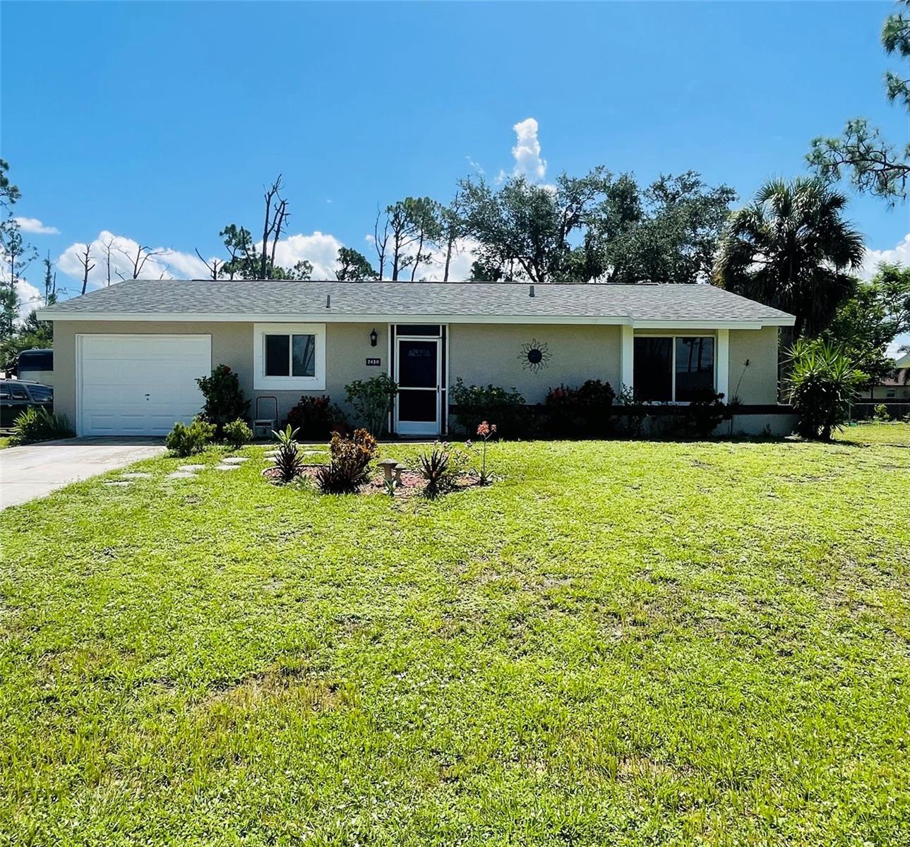 Well kept, 3 Bedroom, 2 Bath, 1 Car Garage home, centrally located in Port Charlotte. Features include Living/Dining Room, Kitchen with newer Stainless appliances and small Breakfast Bar; Rear Lanai and Fenced in Backyard. Updates include newer windows for energy efficiency, hurricane shutters, tile flooring in the living areas and baths, and carpeting in the bedrooms. Blinds and Ceiling Fans throughout. Includes Washer and Dryer. Medium size dog or cat will be considered with a Pet Deposit of $300. NO Restrictive Breed Dogs, NO Exceptions. **Qualifying Criteria includes Minimum Credit Score of 650, Background, Landlord References, and Verifiable Income of 3X's the Rent**.