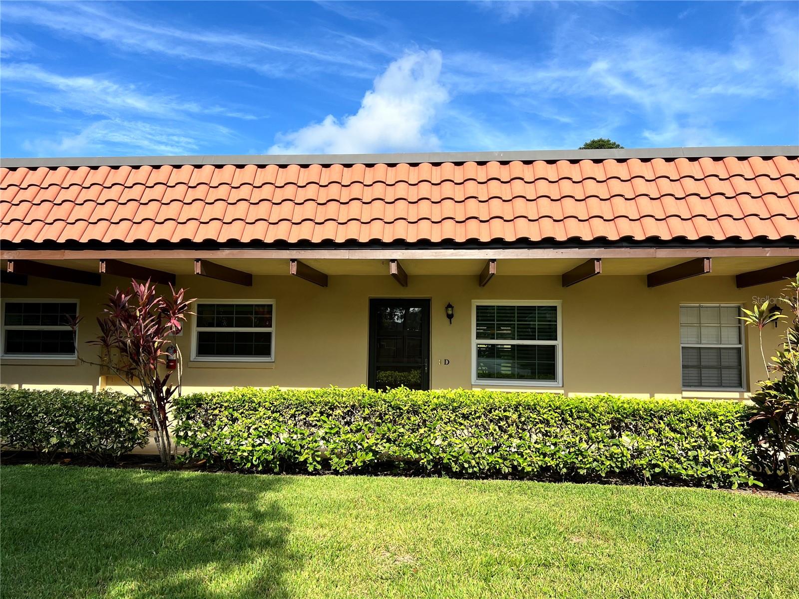 Welcome to Pinehurst Village, a very well-maintained 55+ community in Dunedin FL. Just minutes from the Intercoastal waterfront parks, marina, and downtown Dunedin, this 1 bedroom 1 bath villa is perfectly situated for someone looking for tranquility and easy access to everything beautiful historic Dunedin has to offer. This meticulously cared for villa offers updated impact windows, an updated electrical panel, in-unit washer and dryer, a bonus Florida room and a designated covered parking space. The open floorplan flows from the dining room, through the living room and into the Florida room and the east/west direction allows plenty of sunlight to fill the space. The large bedroom offers two closets for added storage space. There are additional closets in the bathroom and living room as well. The kitchen offers plenty of cabinet space, ample natural lighting, a built-in closet pantry and your indoor washer/dryer unit. The community is equipped with a club house, an oversized heated swimming pool, shuffleboard courts and an outdoor community grilling area for large gatherings. The lush greenery and mature trees make Pinehurst Village scenic and peaceful place to live. Located just blocks from the Dunedin Fine Arts Center, Dunedin Showcase Theater, Highlander Park, and a few minutes from waterfront parks and the Pinellas Trail. Walk, bike and enjoy the Dunedin waterfront! Take advantage of outings with friends and family in downtown Dunedin at one of the many restaurants, shops, and breweries or take in one of the annual Dunedin festivals. All of this within 2 miles of your front door. Don't miss out on this villa and make it your winter spot or year-round residence.