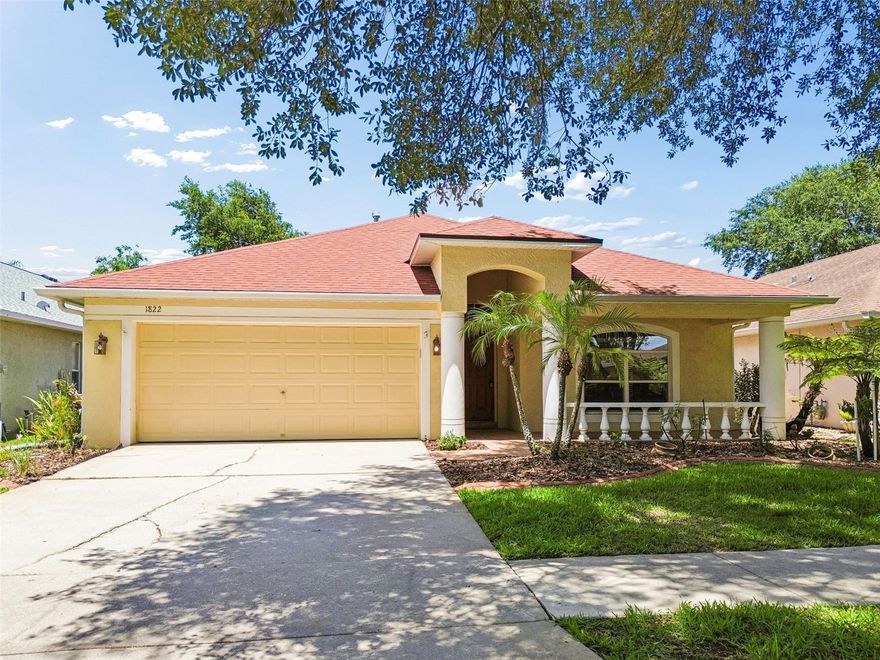 Set within the highly desirable Greystone community of Valrico, Florida, this beautifully maintained 4 bedroom, 2 bathroom pool home offers the perfect blend of comfort, functionality, and move-in ready upgrades. Nestled on a quiet, tree-lined street with mature landscaping and excellent curb appeal, this home immediately stands out with its covered front porch, decorative concrete curbing, newer roof, newer AC system, and updated mechanicals that provide long-term peace of mind for today’s buyers. Inside, the spacious split-bedroom floor plan is designed for both everyday living and entertaining, featuring vaulted ceilings, fresh interior paint, abundant natural light, and multiple living and dining spaces that create flexibility for a variety of lifestyles. The open-concept kitchen overlooks the main living area and screened pool, making it ideal for hosting family and guests. The kitchen is equipped with stainless steel appliances, ample cabinetry, breakfast nook dining, bar seating, and additional space for a future center island if desired. A convenient interior laundry room is located just off the kitchen for added functionality. The privately positioned primary suite creates a true retreat with direct sliding glass door access to the outdoor living space, allowing for seamless indoor-outdoor Florida living. The spacious en suite bathroom features a walk-in closet, soaking tub, separate walk-in shower, and private water closet. Three additional bedrooms offer versatility for guests, a home office, nursery, hobby room, or growing family needs, with the fourth bedroom currently functioning as an office while still maintaining full bedroom capability with an existing closet. Step outside to your own private backyard oasis featuring a screened-in swimming pool, attached spa, expansive paver deck, covered lanai, and decorative fountain accents that create a peaceful resort-style atmosphere. Whether enjoying quiet evenings outdoors, entertaining guests, or spending weekends poolside, this outdoor living space is designed for year-round enjoyment. Conveniently located near top-rated schools, parks, shopping, dining, and major commuter routes, this Valrico pool home offers the upgraded features, functional layout, and Florida outdoor lifestyle buyers are actively searching for in today’s real estate market.(ROOF-2020)(A/C-2021)(W/H-2025)(Generator plug added for easy hook up)