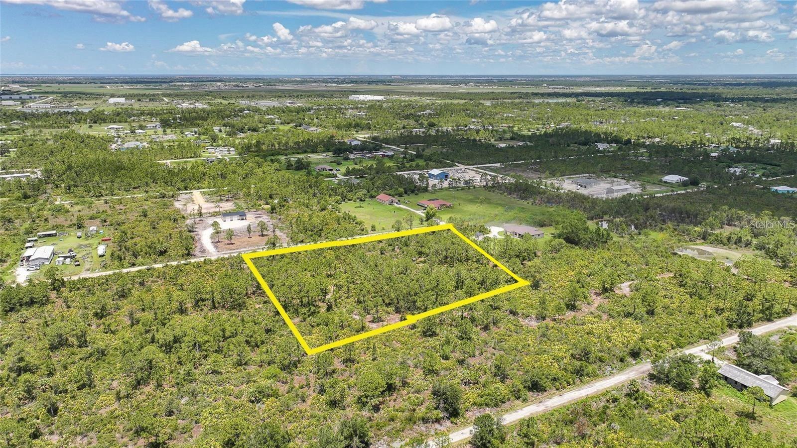 Discover the potential of 8346 Acorn Boulevard, a spacious 2.5-acre vacant lot located in the rural Charlotte Ranchettes community of Punta Gorda, Florida. Zoned Agricultural (AG), this property offers the flexibility to build a custom home, establish a hobby farm, or keep horses and livestock—all without HOA restrictions. The land is mostly cleared with scattered mature trees, providing a blend of open space and natural shade. Electricity is available nearby, making the lot ready for development. A well and septic system will be required, as there are no public water or sewer connections in the area. The property sits in FEMA Flood Zone X, indicating minimal flood risk, and has direct access via an unpaved county-maintained road. Surrounded by a quiet, semi-rural setting, yet just a short drive to downtown Punta Gorda, I-75, and Punta Gorda Airport, this lot combines privacy with convenience. Whether you're looking to build your dream home, store recreational vehicles, or invest in land with long-term potential, 8346 Acorn Blvd presents a rare opportunity to enjoy Florida living on your terms.