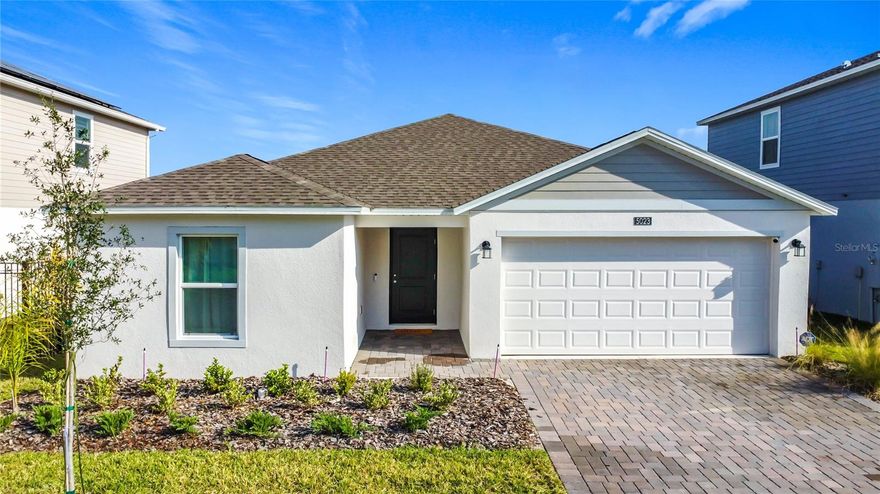 Discover the rare calm of coming home. This stunning 4-bedroom, 3-bathroom single-story residence awaits within the gates of Providence,  an award-winning, 2,200-acre master-planned golf and country club community recognized eleven times as Central Florida's Best Community.  Step inside to an open-concept layout where the kitchen, dining, and family room flow effortlessly together, extending through sliding glass doors to your private back yard with no rear neighbors. A luxurious owner's suite tucked at the rear of the home offers spa-inspired finishes and a generous walk-in closet, while three additional bedrooms provide ample space for family or guests.  The true luxury is what surrounds you. Providence is a sanctuary with over half of its acreage dedicated to lush conservation and green space, creating a sense of serenity that's felt the moment you pass through the 24-hour manned guard gate. Resort-style pools with waterslides, a lap pool, a state-of-the-art fitness center, lighted tennis courts, a dog park, and miles of walking and biking trails are all just steps from your door. At the heart of it all sits the Providence Golf & Country Club, home to an 18-hole championship course by renowned architect Mike Dasher, an elegant 8,000 sq. ft. clubhouse, restaurant, and lounge.  Just minutes from Walt Disney World, Orlando's world-class dining, and easy I-4 access.  Homes in Providence don't stay available long. This is your invitation.