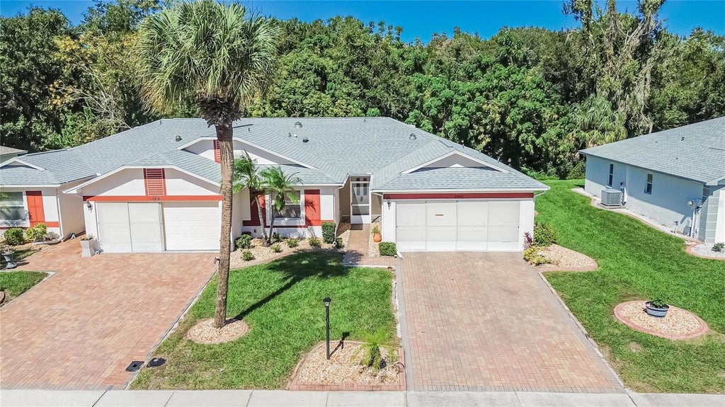 Photo of 1940 Grand Cypress Lane, Sun City Center, FL 33573 (MLS # TB8559365)