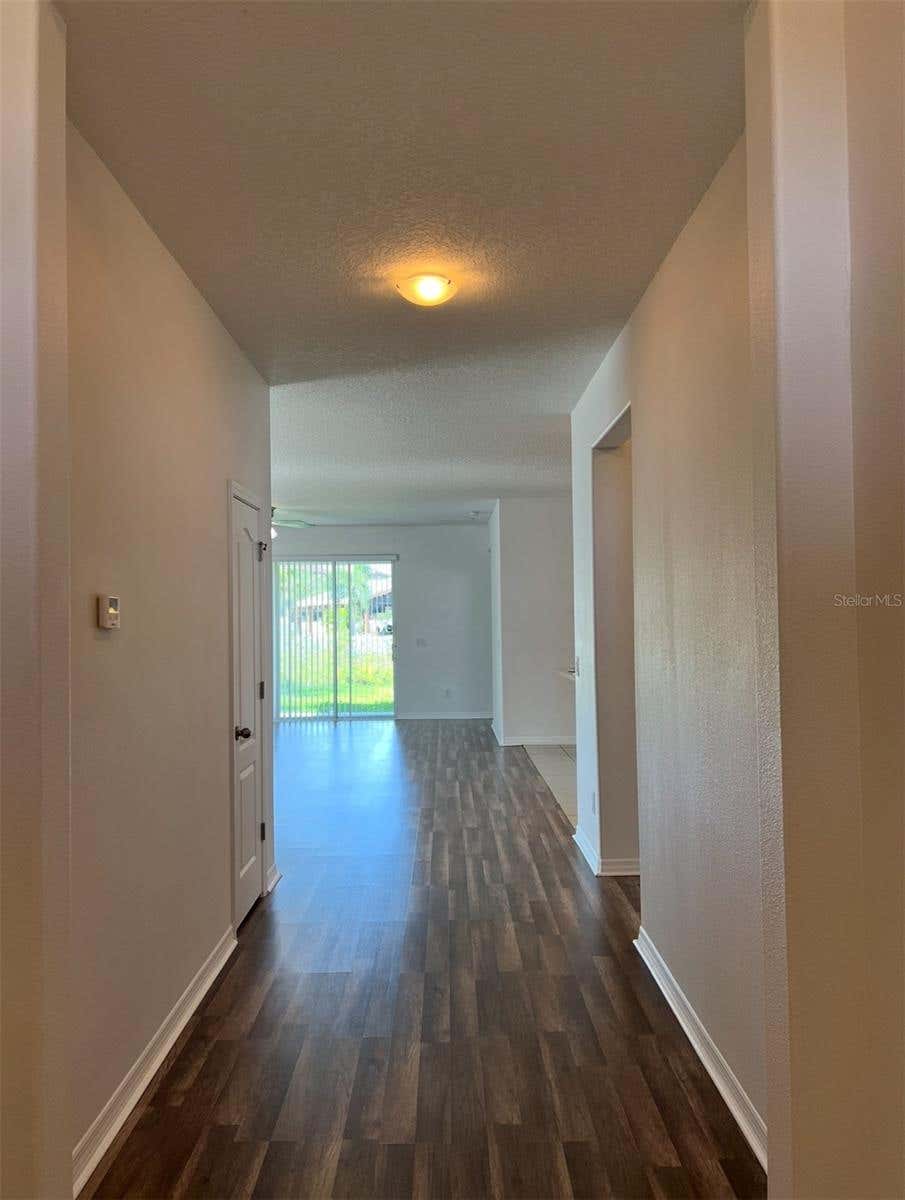 Photo of 2735 Carrickton Circle, Orlando, FL 32824 (MLS # O6418385)
