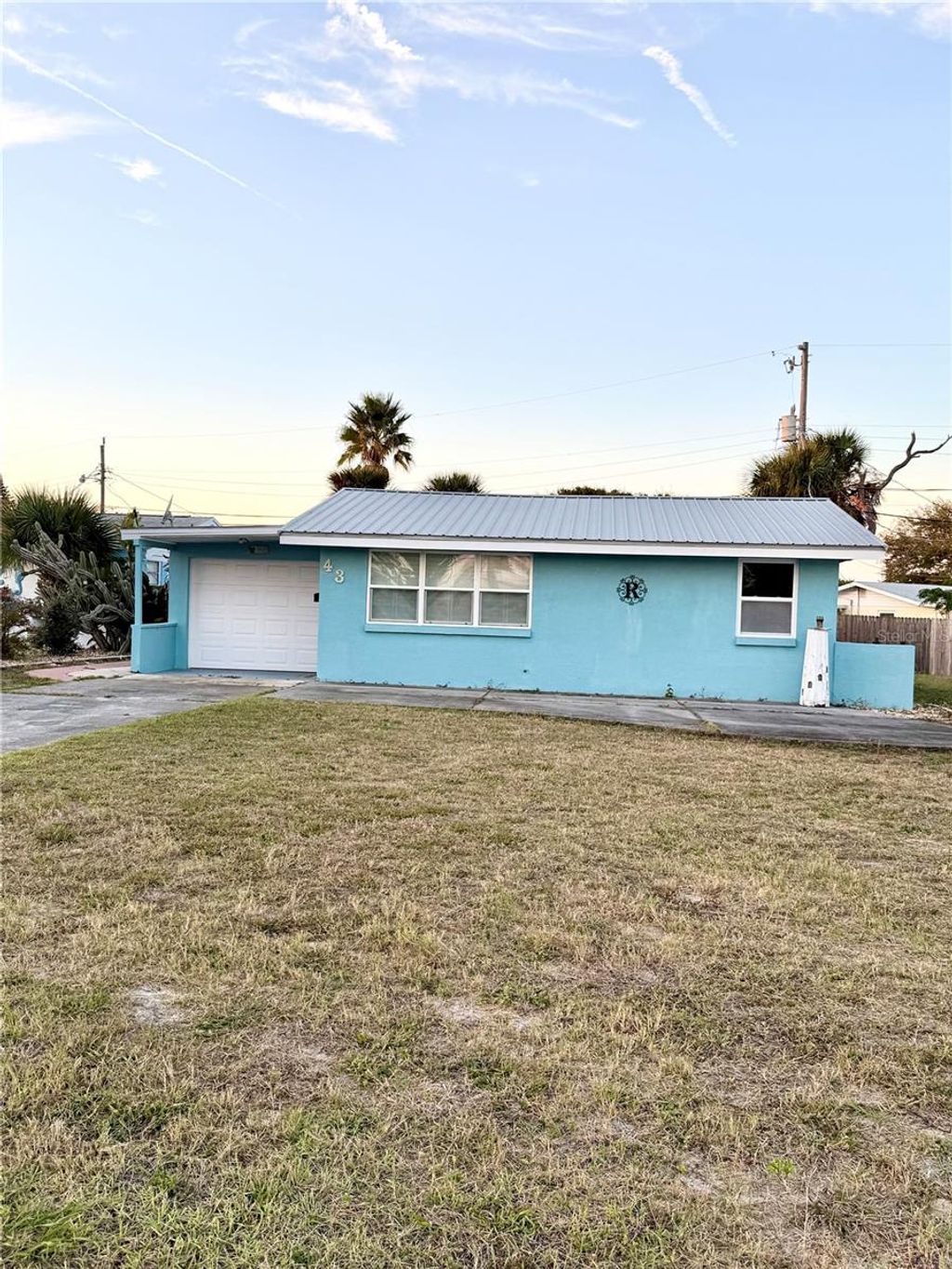 Photo of 43 Hibiscus Drive, Ormond Beach, FL 32176 (MLS # TB8452097)