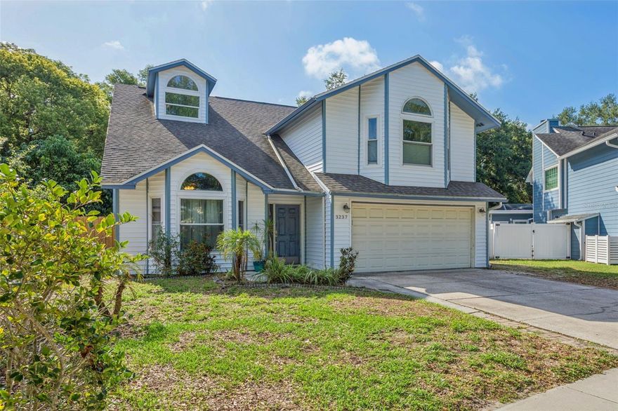 Get ready to move right in to this 4 bedroom, 2 ½ bath pool home with fireplace and two car garage. This house is located on a rare oversized and private lot in the Hamlet at Bentley Park. This home boosts New vinyl siding (2026) New AC system (2026) New Solar Panels (2024) New roof in 2020. The lot has plenty of room for any addition you have in mind and has beautiful mature trees ( plus a Mango tree ) with a fenced backyard, so you may enjoy hosting events in total privacy. This home is bright and airy with cathedral ceilings, skylight, wet bar, and a large eat-in kitchen and large pantry. The master bedroom has beautiful windows with a cozy window seat, and you can spend hours in your master bath with garden tub, shower, and dual sinks. The closet space is a dream with plenty of room for all your accessories.  The community is close to the local middle school and located in the desirable Palm Harbor University High School district. Be prepared to enjoy an abundance of amenities in your new community including tennis courts, community park, community pool with hot tub/spa. This will not last long so call for your appointment now!