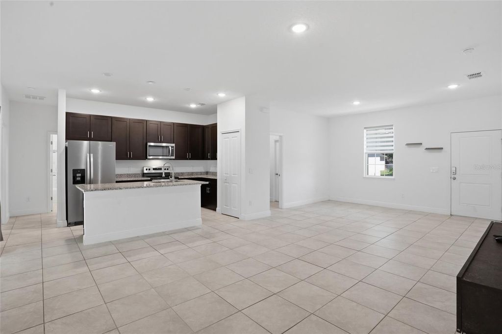 Photo of 1010 Mayfair Place, Kissimmee, FL 34758 (MLS # O6399858)