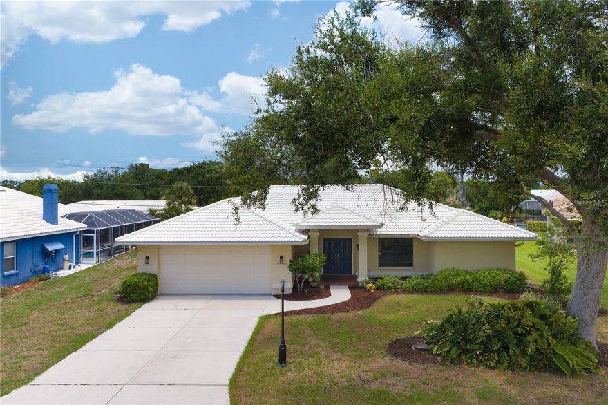 Close to an array of natural attractions . . . The warm welcome of this appealing and delightful 3-bedroom, 2-bathroom Split floor plan is a special treasure located in the Sorrento East neighborhood in Sarasota County. On a quiet, low-traffic street, the home is only minutes to parks and open spaces (Oscar Scherer state park, Casey Key Beach and Downtown Venice). Enjoy an open air brick patio and an oversized screened back porch. There is plenty of natural light through out the house along with vaulted ceilings adding a comfortable airflow and a sense of spaciousness. As a sanctuary to relax at night and recharge for tomorrow, the main-floor primary bedroom cannot be beat. In addition to the convenience of the private bathroom (walk-in shower), you will find ample closet space to let your wardrobe breathe. The other two bedrooms are conveniently accessible from the main floor. A driveway with ample accommodation for two vehicles leads to an attached two-car garage that is available for its original purpose. This lovely abode is a special opportunity. Someone's going to be very happy here . . . let it be you! Have fun packing this one full of warmth and memories. Call today!!!