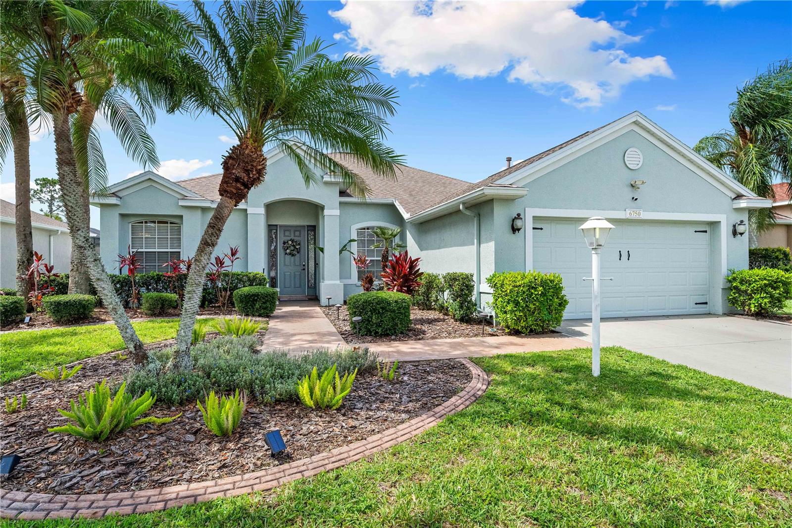 Welcome to a one-of-a-kind stunning POOL home that blends modern elegance with everyday comfort. Meticulously remodeled with high-end finishes and designer touches throughout, this 3-bedroom + den, 2-bath home offers 2,148 square feet of open, light-filled living space—designed to impress, with a gorgeous pool, lanai, gas stove and a floor plan for real life. In addition to the home remodel, other incredible upgrades include a 2020 ROOF, a whole home generator, an upgraded Solar Hot Saltwater system for the pool and a water filtration system with reverse osmosis in the Kitchen and a whole house surge protection. The living room, styled with a warm modern farmhouse aesthetic, centers around a cozy electric fireplace, creating the ideal space to gather, relax, and make lasting memories. The gourmet kitchen with a gas stove seamlessly connects to this space, making entertaining a breeze. The spacious primary suite offers a spa-like retreat with a beautifully tiled walk-in shower, dual vanities, and two walk-in closets. Two additional bedrooms sit at the other end of the home, a flexible den/office, and a second full bath allows plenty of space for family and guests. Step outside to your private backyard oasis with a covered patio, lush landscaping, and room to relax or entertain under the stars with a breathtaking view of the pool. Nestled in a sought-after neighborhood near a boat ramp and two minutes from Jiggs Landing, central to all the areas you want to be near such as St Pete Beach, Anna Maria or Siesta Key, this home has everything you need! This home is stylish, spacious and move-in ready. Homes like this only come available every so often. This is the perfect opportunity to discover the joy of homeownership.