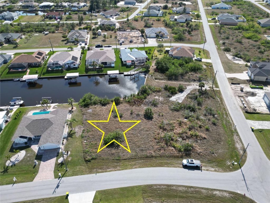 Photo of 15562 Mccomb Circle, Port Charlotte, FL 33981 (MLS # D6140563)