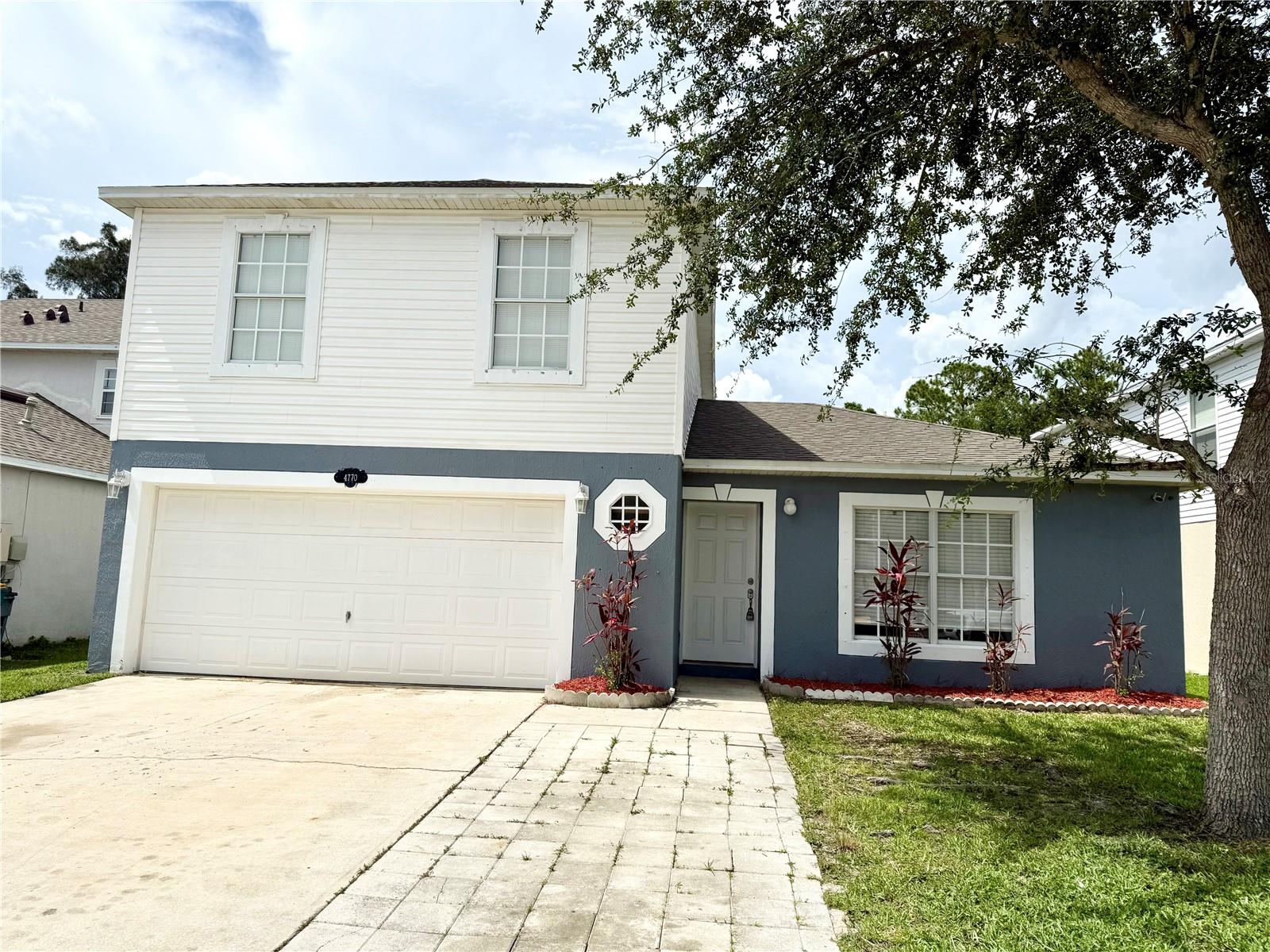 Welcome to the Palmwood community!
This spacious 2-story home offers 4 bedrooms, 3 bathrooms, a 2-car garage, and extended driveway with pavers—perfectly suited for its next owners. Enjoy the flexibility of having a Primary Suite both upstairs and downstairs. The open living and dining area features stylish LVP flooring, while the upstairs boasts brand-new carpet. Freshly painted inside and out, the home also includes a new roof, updated AC, and is fully compliant with all 4-point inspection requirements. The house has a Taexx Built-in Pest Control network throughout the walls. It also has custom built Hurricane covers with built-in mounts. Step outside to a screened patio and a private, fenced backyard with no rear neighbors.