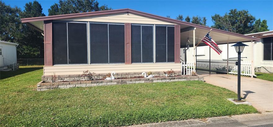 This turnkey-furnished 2BR/2BA home offers comfort, functionality, and great potential in the friendly 55+ community of Westwinds Village. Enjoy an enclosed front lanai for extra living space, a covered carport, and a screened patio with a workshop/storage area that houses the washer and dryer in a separate enclosed shed.

Inside, the home features a central kitchen with abundant cabinet and counter space, the placement of the windows throughout the home create a bright, airy feel. The primary suite includes an ensuite bath, while the guest bedroom and second bath are positioned at the rear of the home for added privacy. While the interior is ready for your personal touch and updates, the home is priced accordingly, offering an excellent opportunity to create your ideal Florida retreat. This home is also brought to you optionally turnkey furnished down to the spoons and forks!

Westwinds Village provides an inviting, pet-friendly lifestyle with friendly neighbors and resort-style amenities. Residents enjoy a clubhouse, heated pool and hot tub, shuffleboard, bocce ball, billiards, cards, community dinners, trips, and more. RV and boat storage is available at special resident rates, and golf carts are welcome—perfect for exploring this peaceful, well-maintained neighborhood.

Come see this wonderful home today and envision the possibilities of your perfect Florida lifestyle! (Addtional pictures to follow)