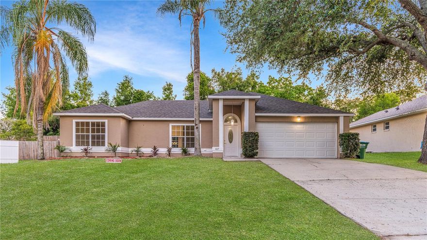 One or more photo(s) has been virtually staged. Welcome to 617 Applegate Terrace, a spacious 3-bedroom, 2-bathroom gem nestled in the heart of Deltona Lakes! This NEWLY RENOVATED 1,732 sq ft single-family home, with 2024 ROOF, 2025 AIR CONDITIONING, built in 1990 on a generous 0.23-acre lot, offers an open floor plan with cathedral ceilings, a kitchen/family room combo, and walk-in closets for that perfect blend of comfort and functionality. Tile and hard surface flooring throughout keeps things cool and easy to maintain, while the attached 2-car garage provides ample storage and convenience. Step inside to find a bright living/dining area ready for your personal touch, complete with sliding doors leading to the backyard. The kitchen comes equipped with NEW QUARTZ COUNTERTOPS, and nearly new stainless steel appliances. The primary bedroom is large and oversized, with a RENOVATED PRIMARY BATHROOM, featuring a frameless glass shower. Outside, the stucco exterior and shingle roof add curb appeal, all on a quiet terrace just a mile from the Amazon Fulfillment Center for easy commuting. You're also minutes from Halifax Hospital, local movie theaters, and 1-4 Exit 114, making this spot ideal for families or investors alike. Priced to move and full of potential-whether you're flipping, renting, or making it your forever home-this is your chance to own in booming Deltona. Schedule a showing today and let's make it yours!