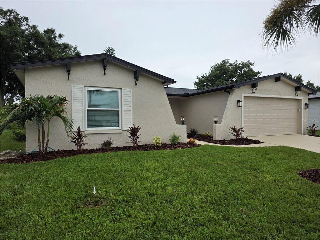 Photo of 8448 Newton Drive, Port Richey, FL 34668 (MLS # TB8528558)