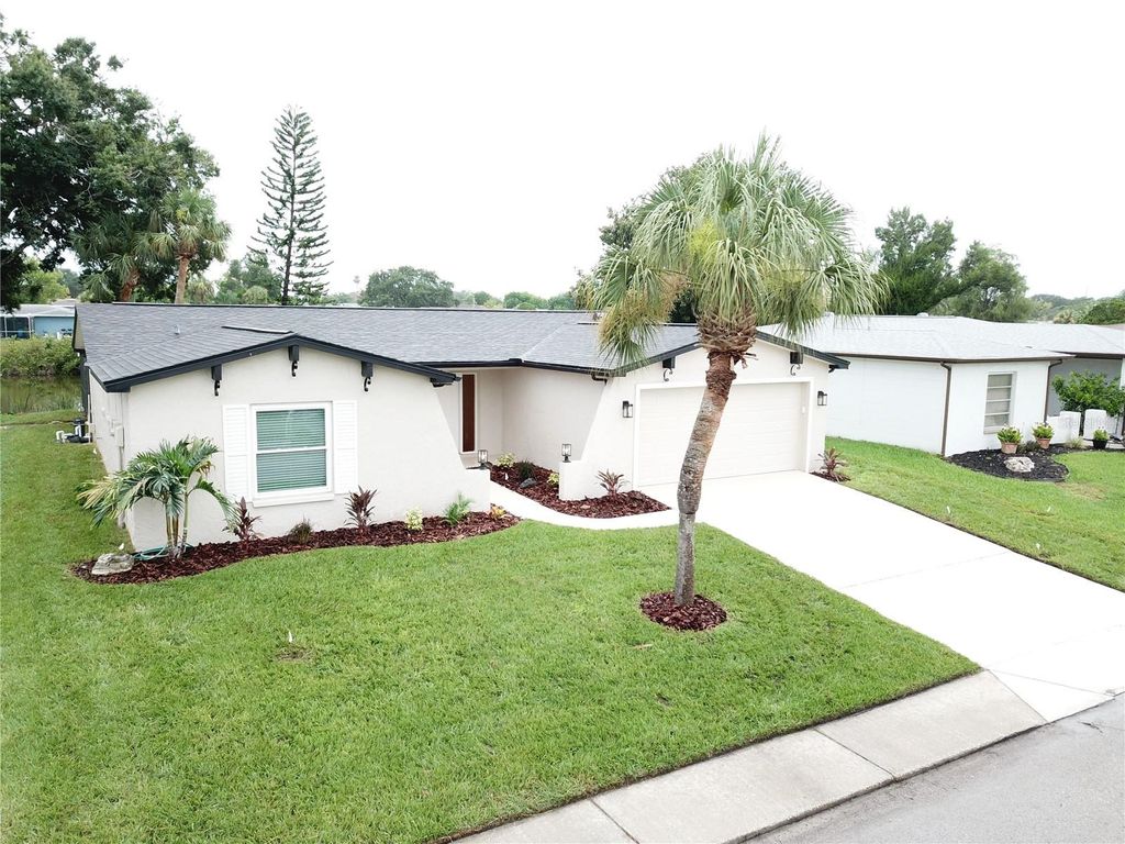 Photo of 8448 Newton Drive, Port Richey, FL 34668 (MLS # TB8528558)