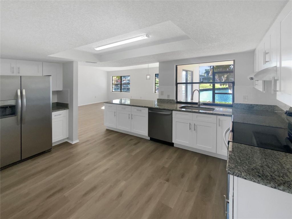 Photo of 7846 Cayuga Drive, New Port Richey, FL 34653 (MLS # O6371446)