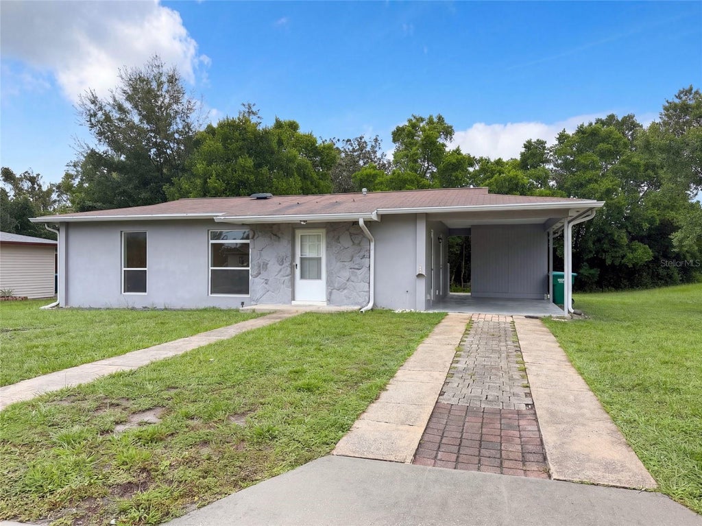 Photo of 1521 Fort Smith Boulevard, Deltona, FL 32725 (MLS # O6443153)