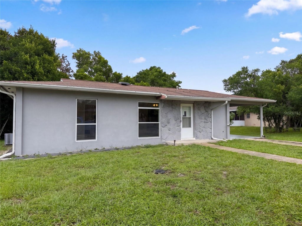 Photo of 1521 Fort Smith Boulevard, Deltona, FL 32725 (MLS # O6443153)