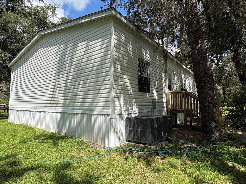 Photo of 33284 Rowntree Drive, Dade City, FL 33523 (MLS # TB8417846)