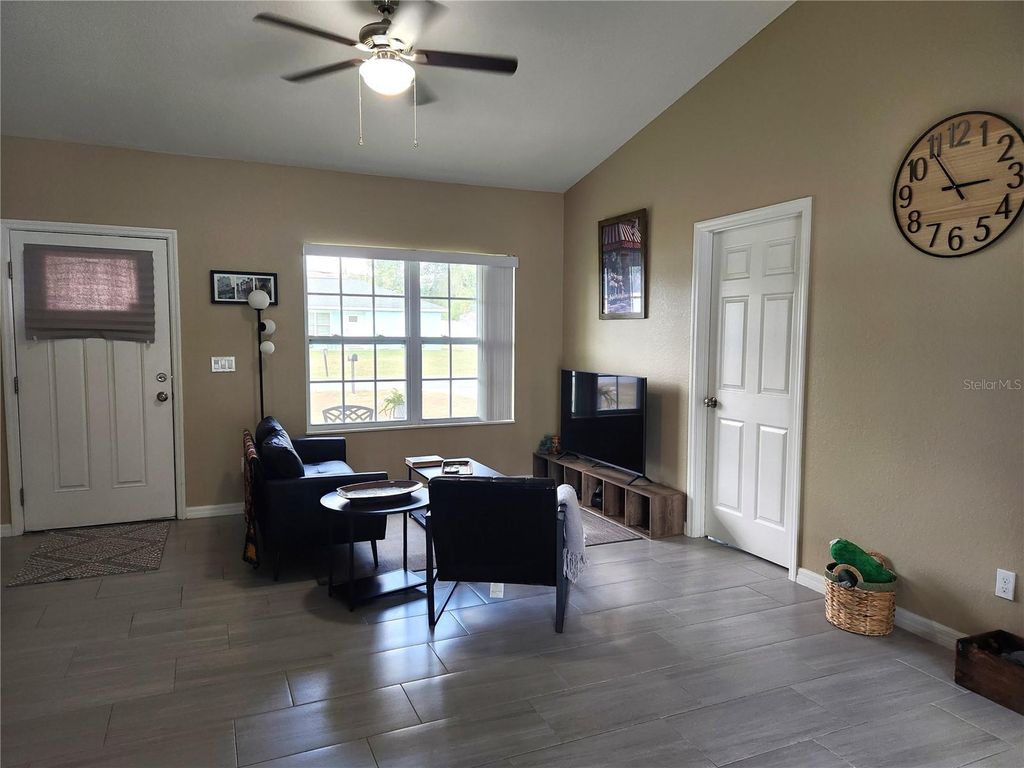 Photo of 6834 SE 107th Place, Belleview, FL 34420 (MLS # OM716519)