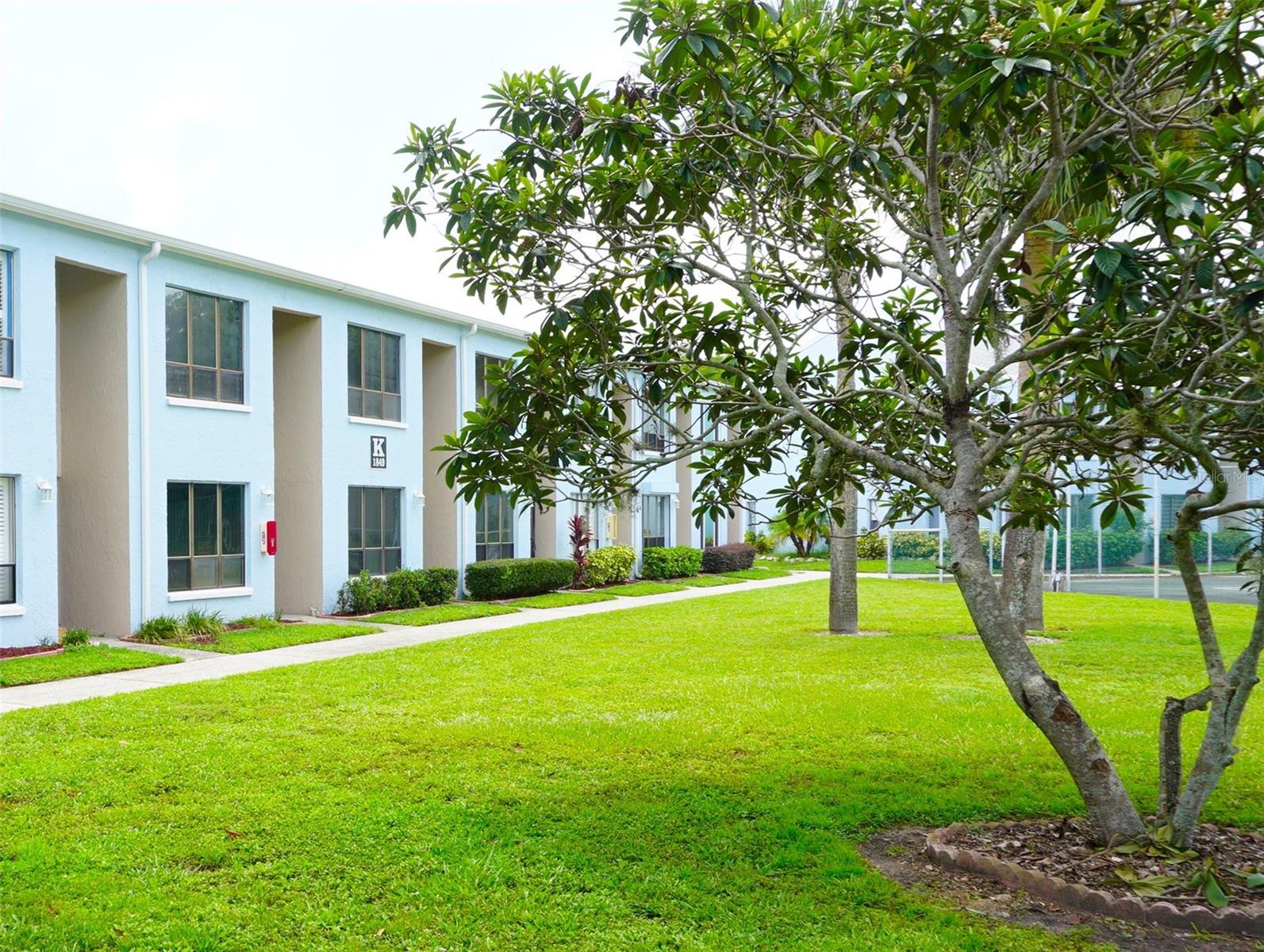 Seller financing available for this spacious 3-Bedroom/3-Full Bath Townhome style condo in the gated nudist/clothing-optional community of Paradise Lakes. Neutral colors and wood laminate/tile/carpet throughout. The kitchen features solid granite countertop, updated cabinets, smooth-top range, built-in microwave, side-by-side refrigerator, dishwasher, breakfast bar, and understairs pantry closet. Open concept living/dining room area with high ceilings. Two en-suite bedrooms are located upstairs with closets and linen storage. The floorplan offers a separate lock-out unit with kitchenette, closet, wall AC unit, and bath with extended vanity and tub/shower combination. Full size front-load washer/dryer included for convenience. Attic storage space with access from upstairs bedroom. Ideal for owner of investor seeking potential rental income. Buyer is responsible for verifying all information, details, and dimensions. Condo association approval of Buyer is required including application, fee, background check, orientation, and membership in a recognized nudist organization. Optional membership to Paradise Lakes Resort is not included in monthly condo association fee.