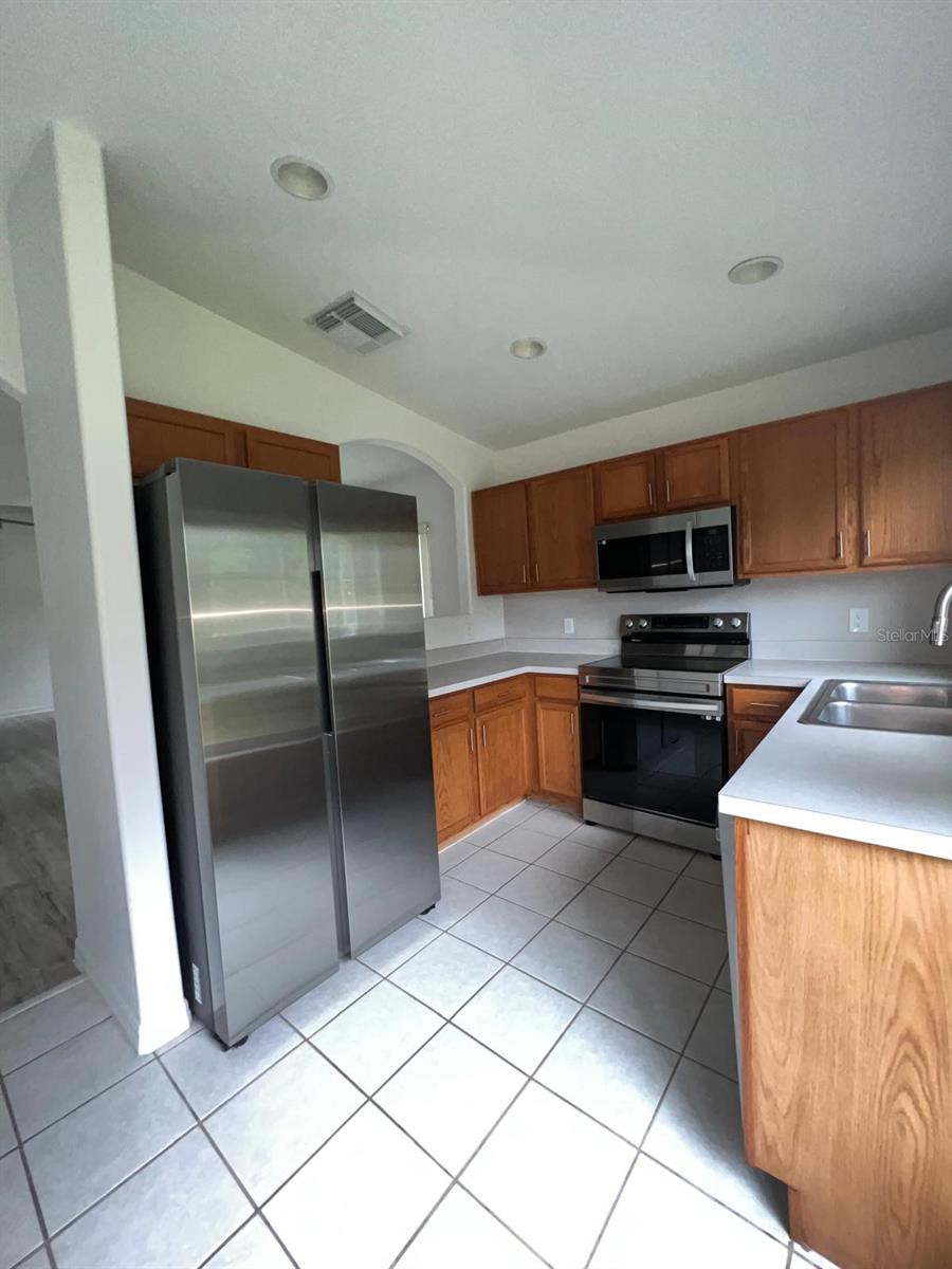 Photo of 2840 Osprey Cove Place #201, Kissimmee, FL 34746 (MLS # O6451117)