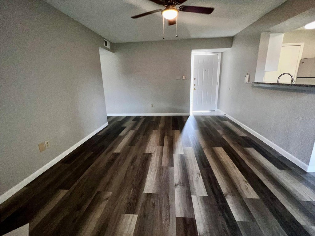 Photo of 4355 Perkinshire Lane #104, Orlando, FL 32822 (MLS # O6440537)