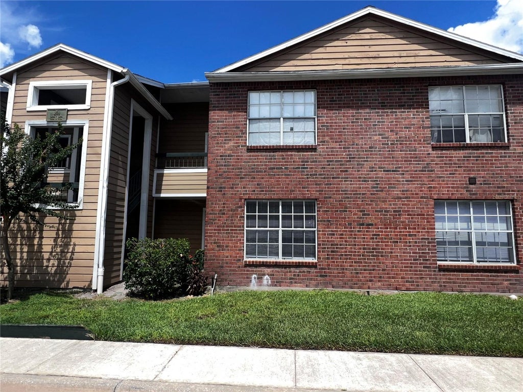 Photo of 4355 Perkinshire Lane #104, Orlando, FL 32822 (MLS # O6440537)